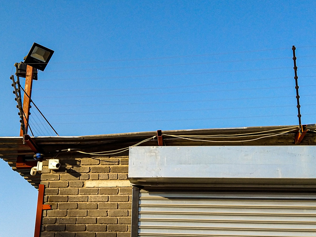 Electric Fence on Roof of Building